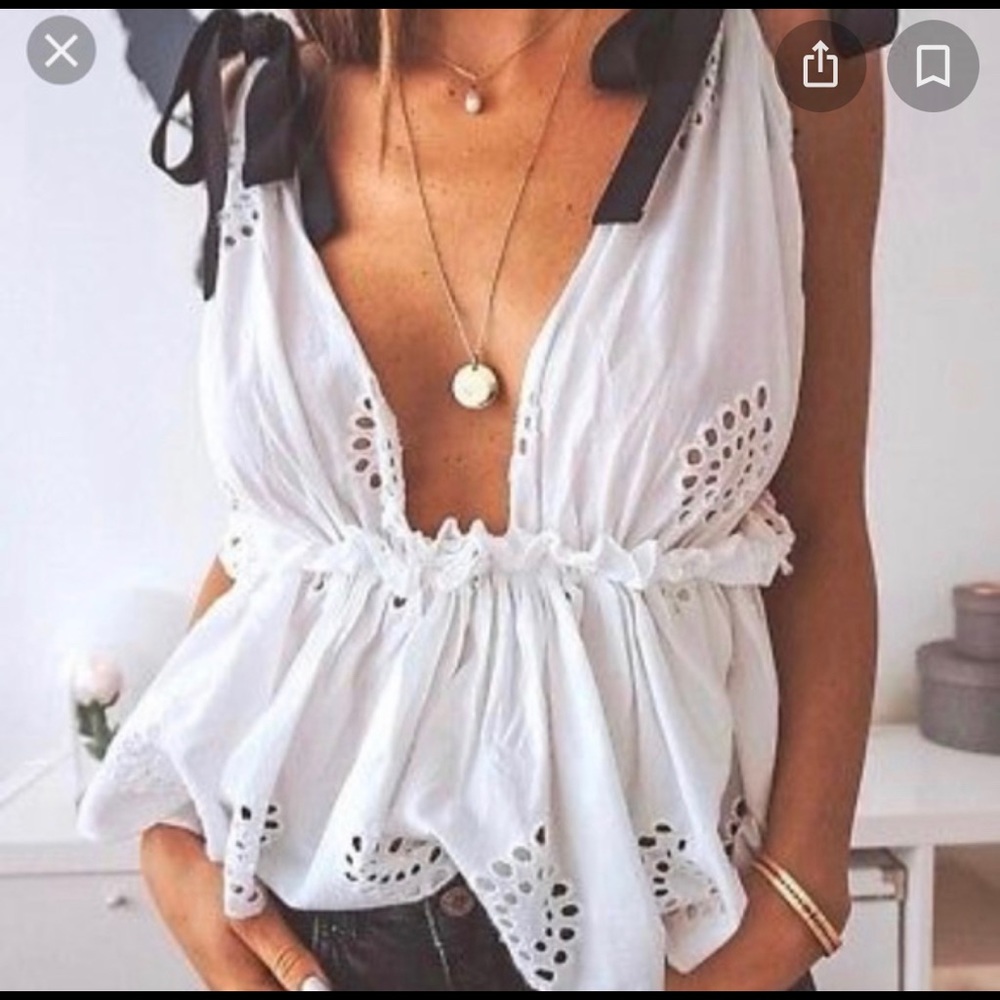 Zara white top with black bows